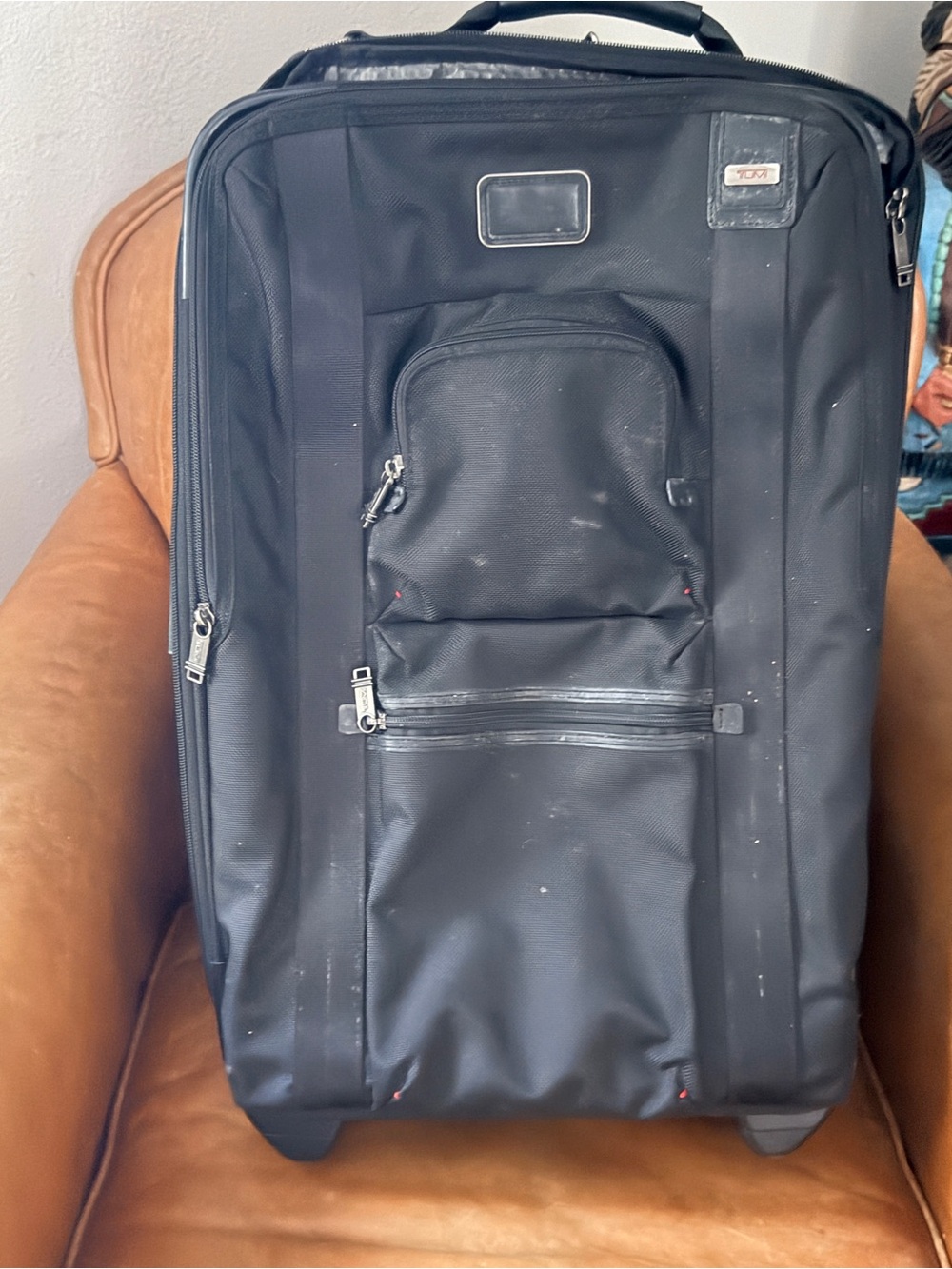 Tumi Black Rolling Suitcase with Front Pocket